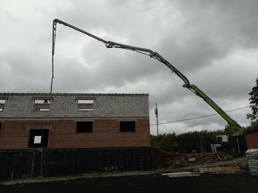 Двухэтажное производственное здание с подвалом